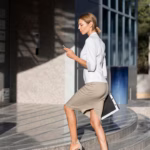 side-view-woman-going-up-stairs_23-2148692779